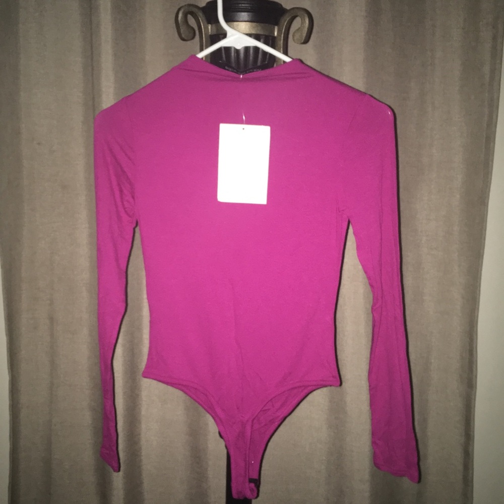 Size: medium, long sleeve, hot pink bodysuit